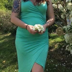 A symmetrical dress teal